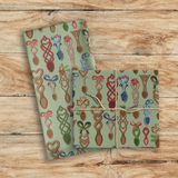 Festive Lovespoons welsh theme Tea Towel